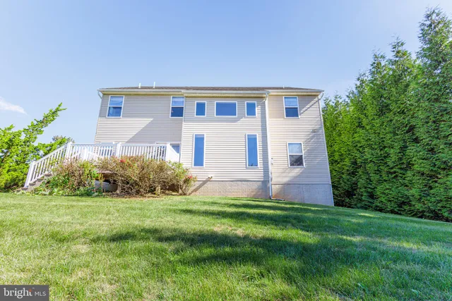 a house view with a garden space