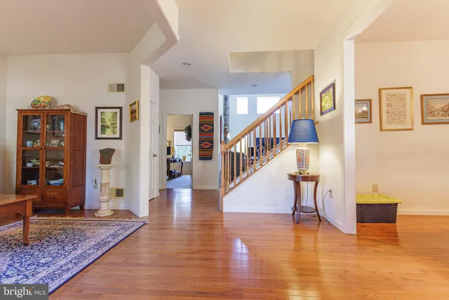a view of an entryway and livingroom with furniture