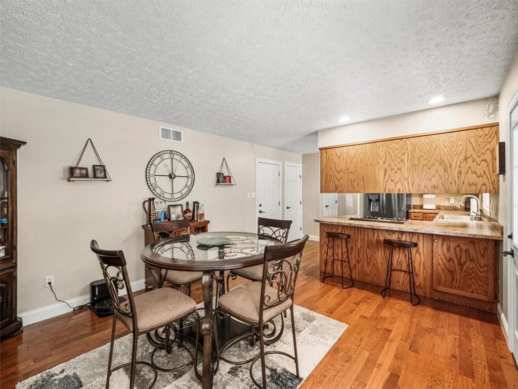 27 Spring Valley Street Slovan, PA 15078 - Photo 13 of 30 a view of a dining room with furniture window and wooden floor