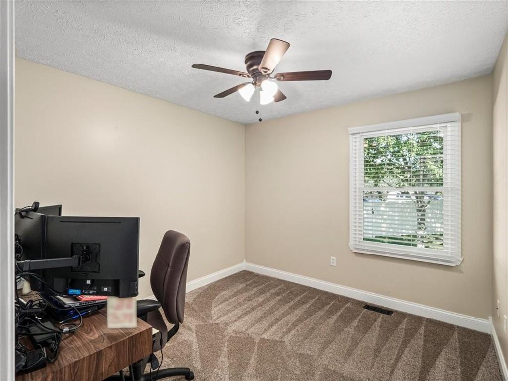 27 Spring Valley Street Slovan, PA 15078 - Photo 19 of 30 a workspace with a window