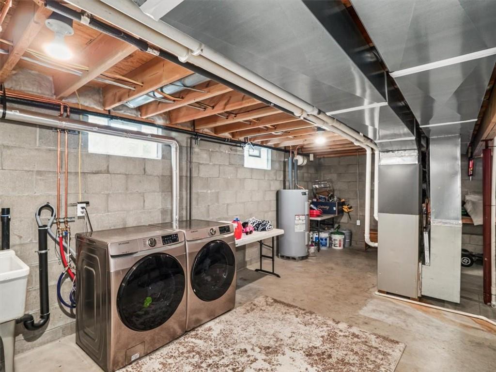 27 Spring Valley Street Slovan, PA 15078 - Photo 22 of 30 a view of a storage and utility room