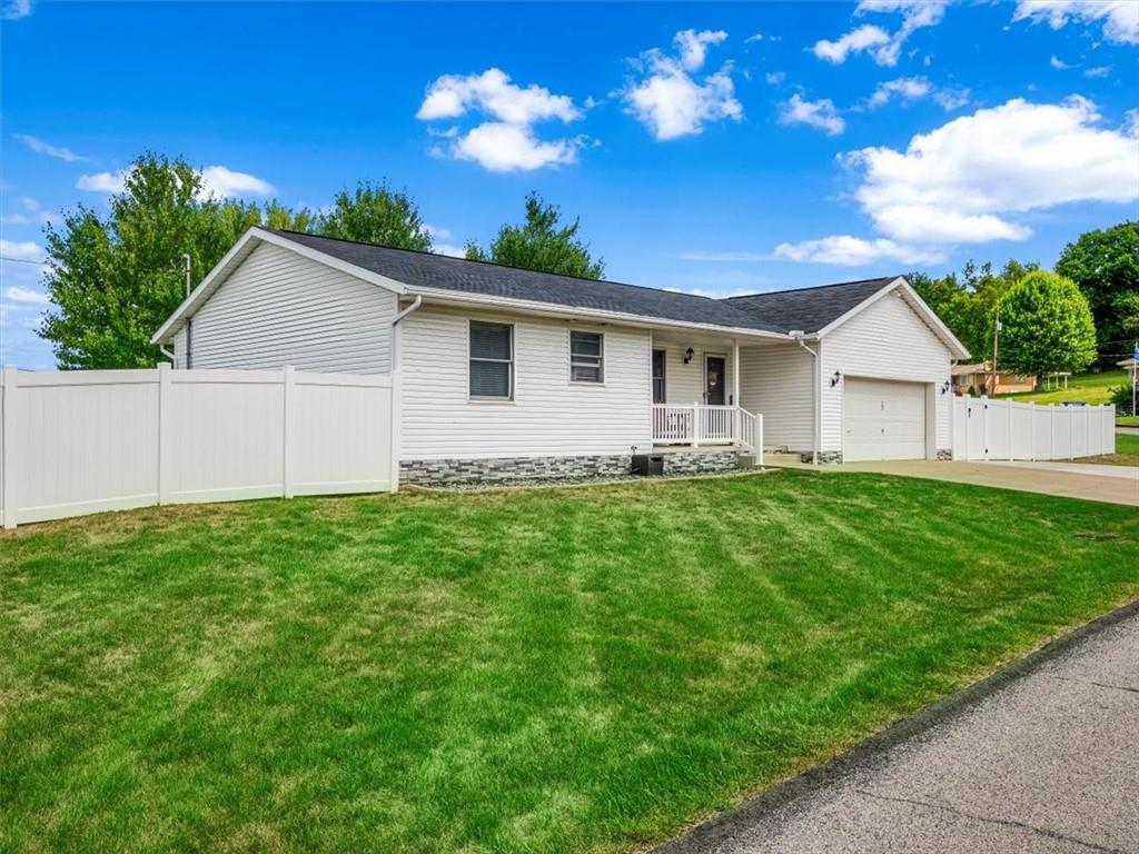27 Spring Valley Street Slovan, PA 15078 - Photo 3 of 30 a view of a house with a yard