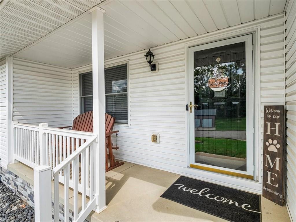 27 Spring Valley Street Slovan, PA 15078 - Photo 5 of 30 a view of a door with a door and a window
