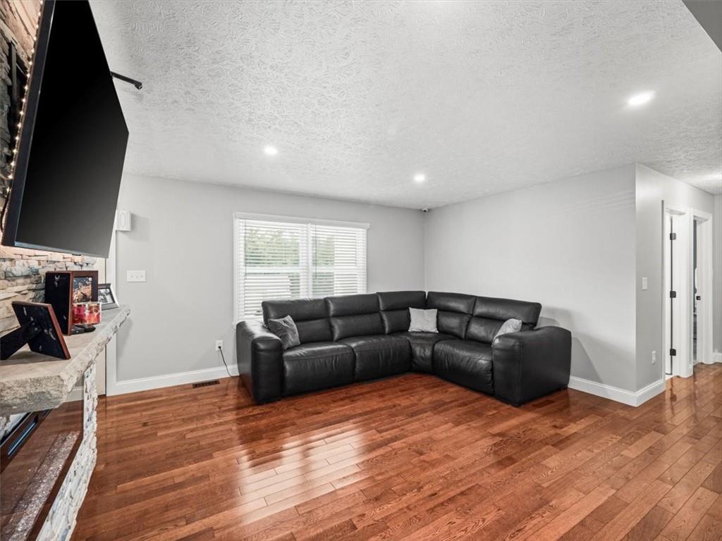 27 Spring Valley Street Slovan, PA 15078 - Photo 8 of 30 a living room with furniture window and wooden floor