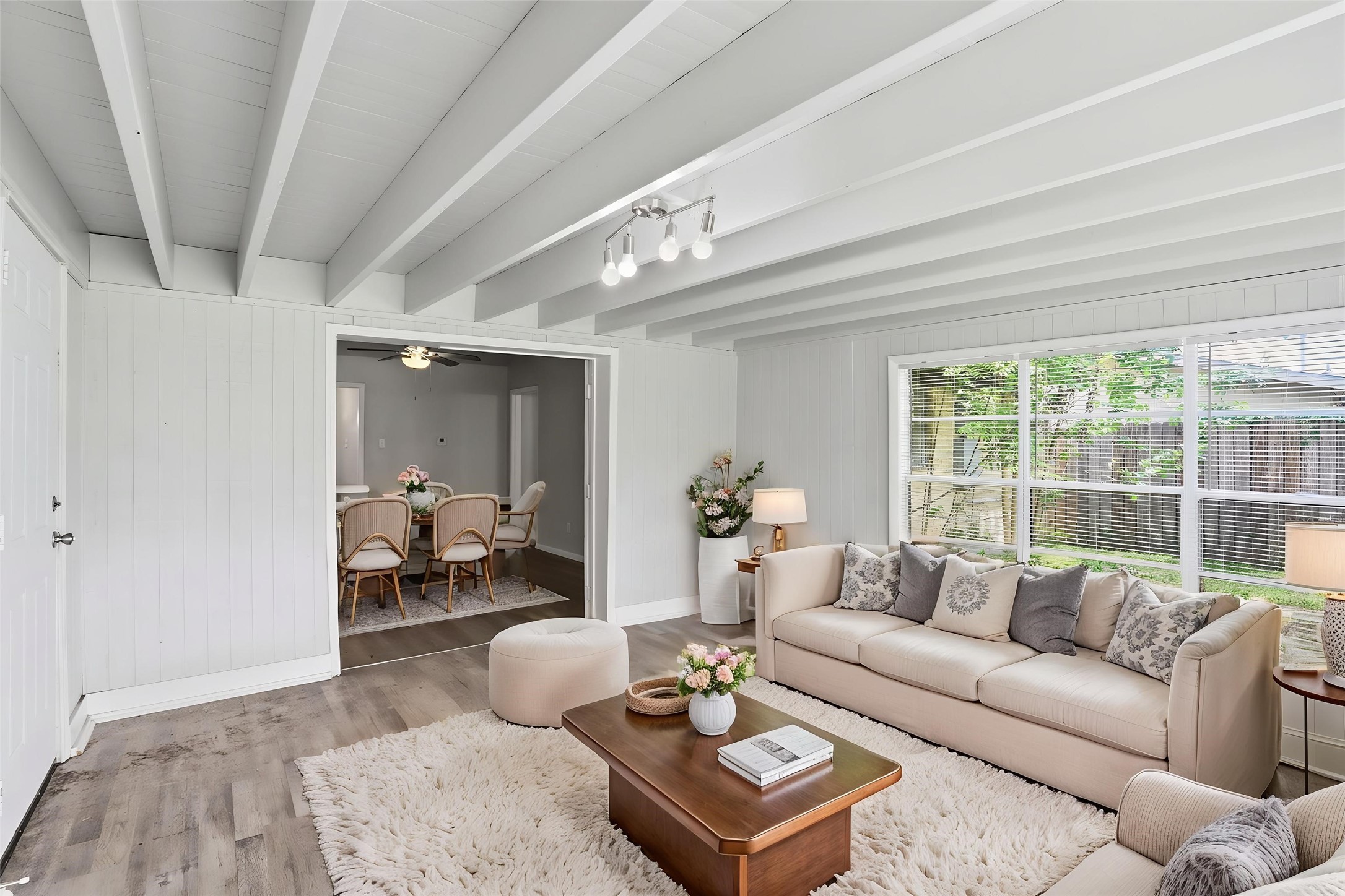 5242 Grace Point Lane Houston, TX 77048 - Photo 2 of 38 a living room with furniture and a large window