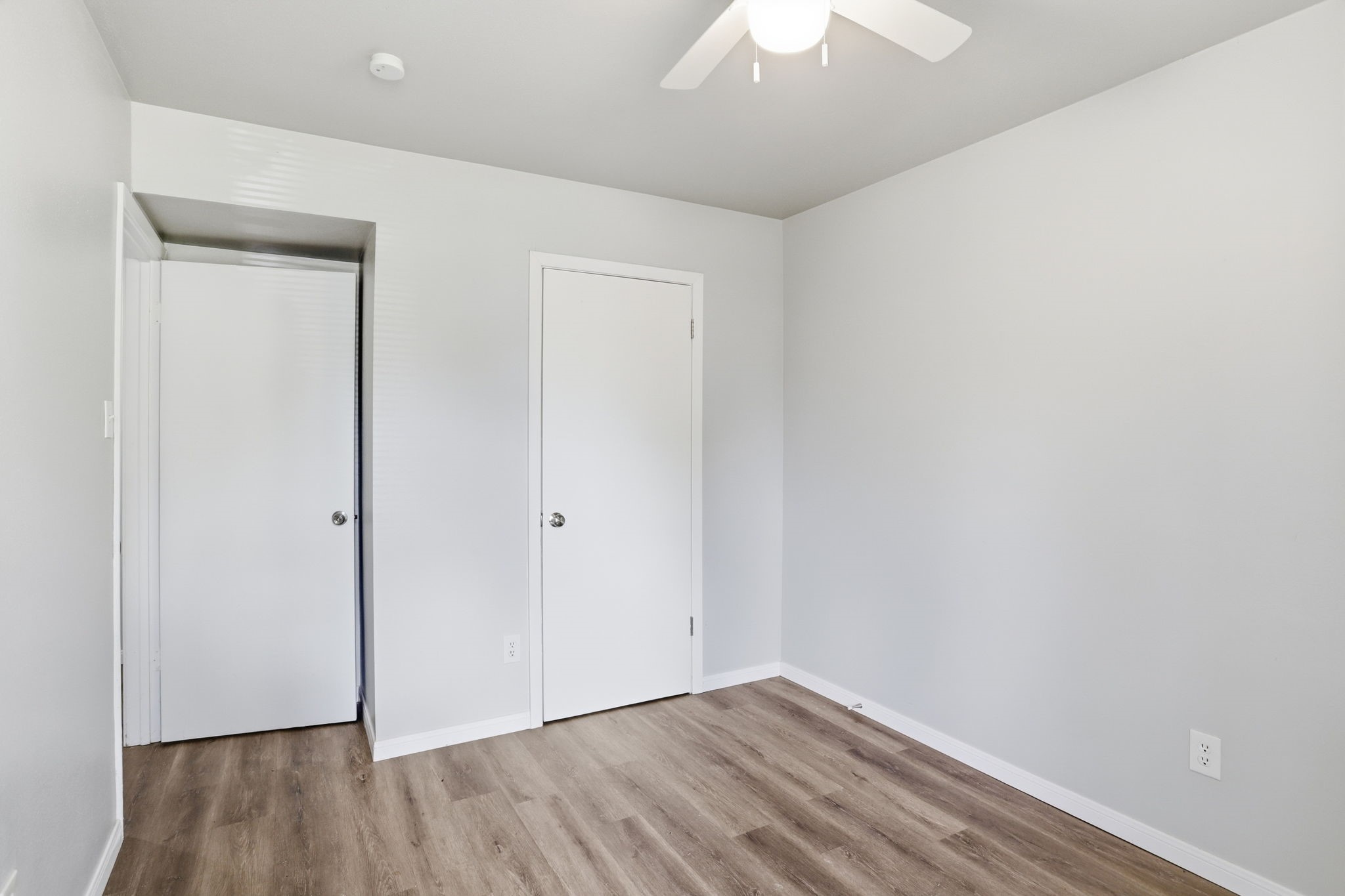 5242 Grace Point Lane Houston, TX 77048 - Photo 25 of 38 a view of an empty room with wooden floor