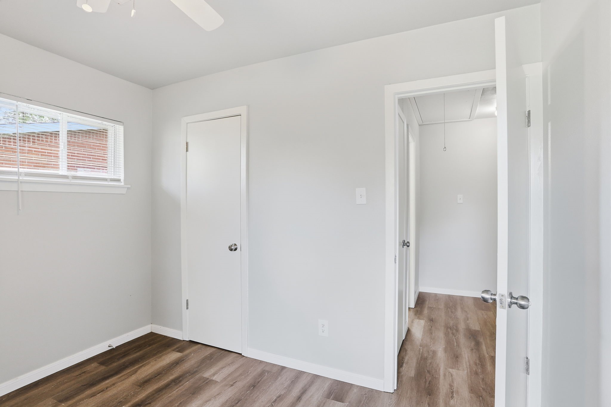 5242 Grace Point Lane Houston, TX 77048 - Photo 27 of 38 a view of a room with wooden floor