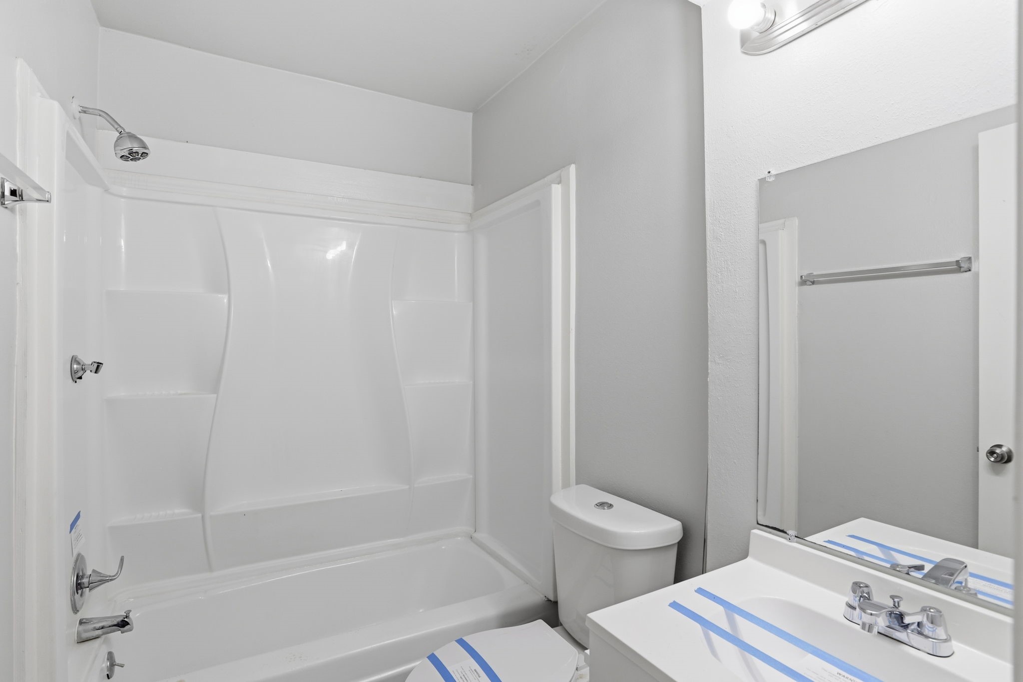 5242 Grace Point Lane Houston, TX 77048 - Photo 30 of 38 a bathroom with a sink a toilet and shower