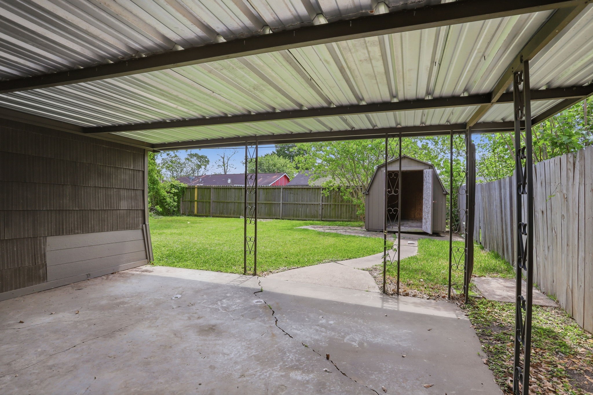 5242 Grace Point Lane Houston, TX 77048 - Photo 32 of 38 a view of yard with porch