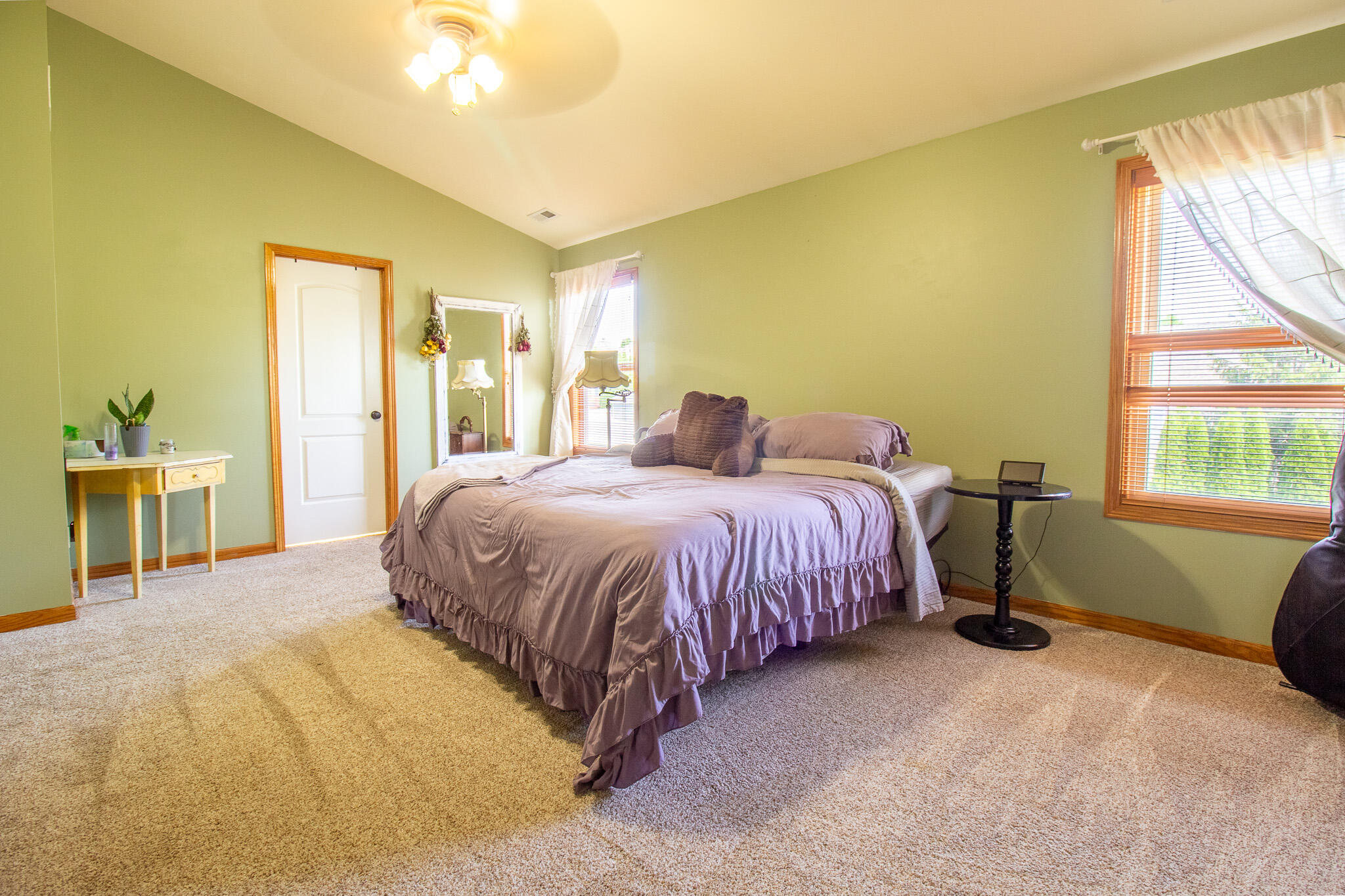 2550 Honelee Court Valparaiso, IN 46385 - Photo 20 of 37 a spacious bedroom with a bed and a window