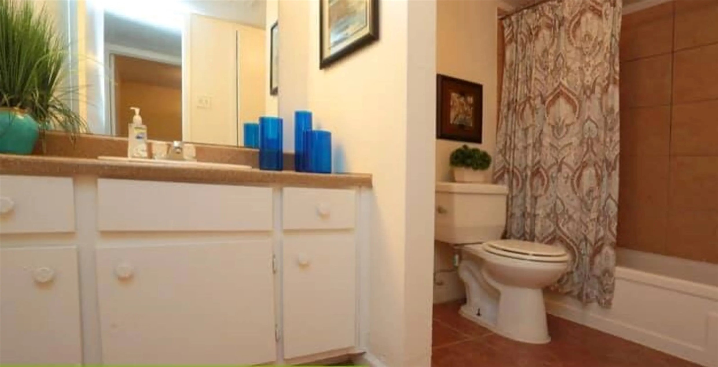 4300 Shaver Street, Unit 86 Houston, TX 77034 - Photo 4 of 9 a bathroom with a toilet and a sink