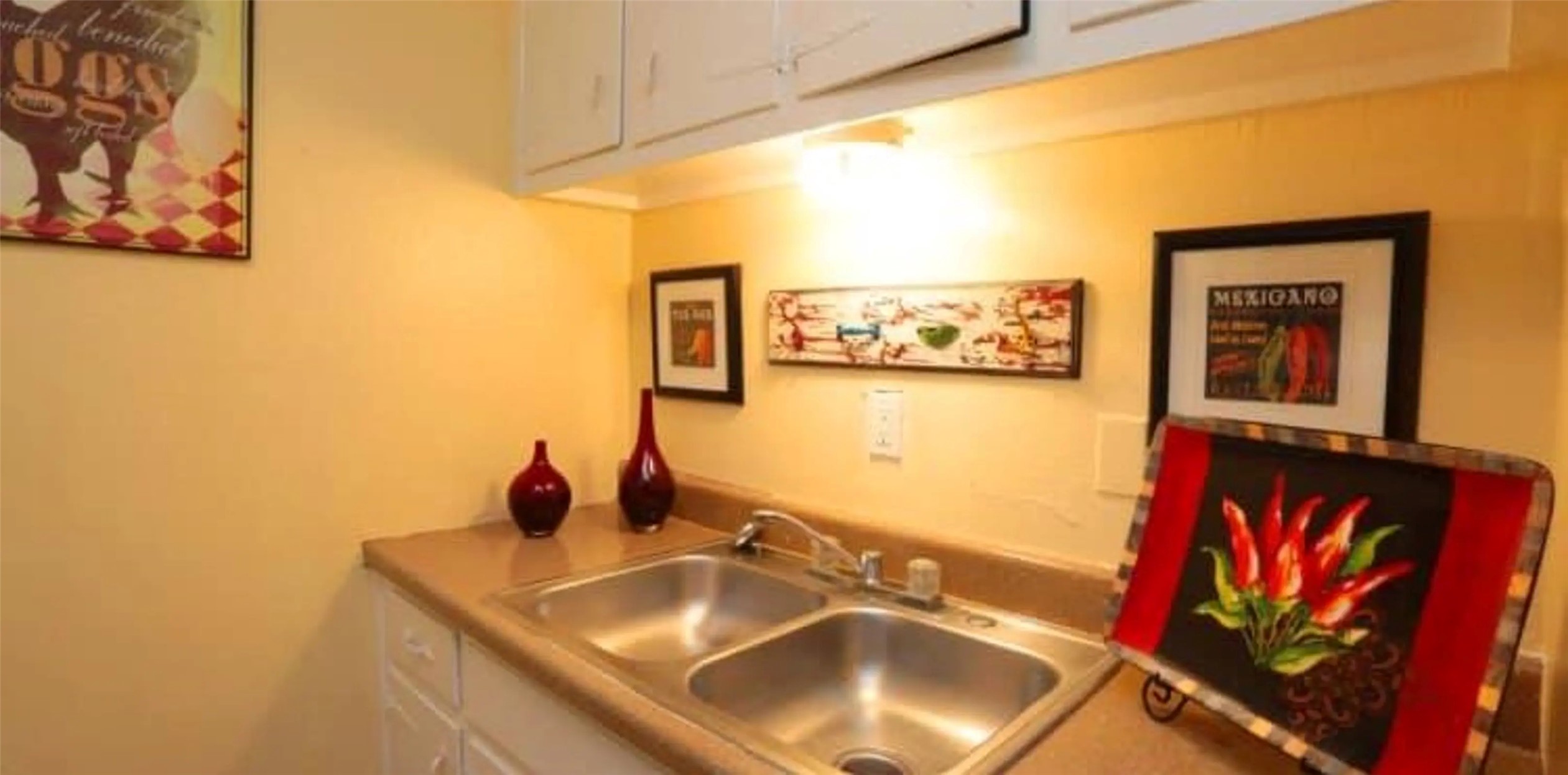 4300 Shaver Street, Unit 86 Houston, TX 77034 - Photo 5 of 9 a bathroom with a sink and a mirror