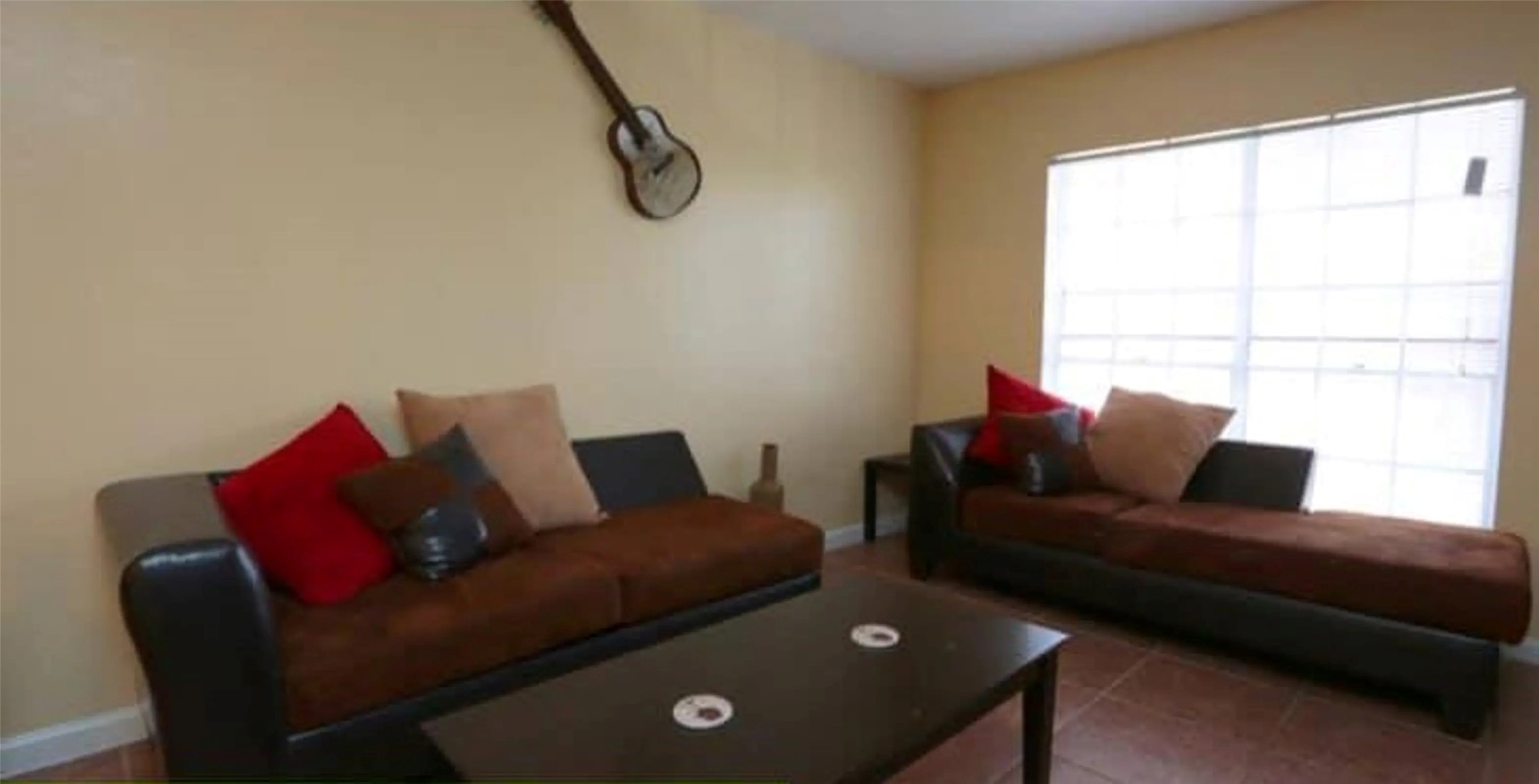 4300 Shaver Street, Unit 86 Houston, TX 77034 - Photo 8 of 9 a living room with furniture and a window