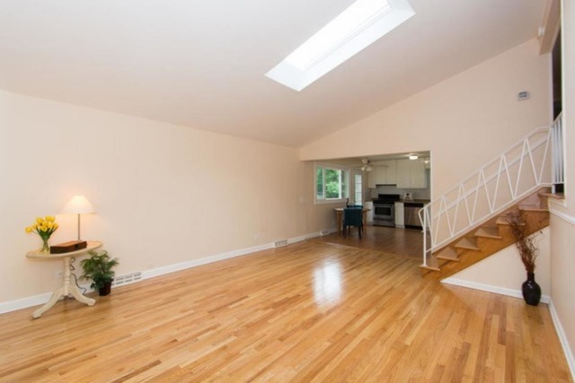 716 Ranch Road Wheaton, IL 60187 - Photo 5 of 24 a view of empty room with wooden floor