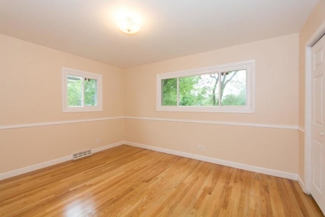 716 Ranch Road Wheaton, IL 60187 - Photo 10 of 24 an empty room with a window