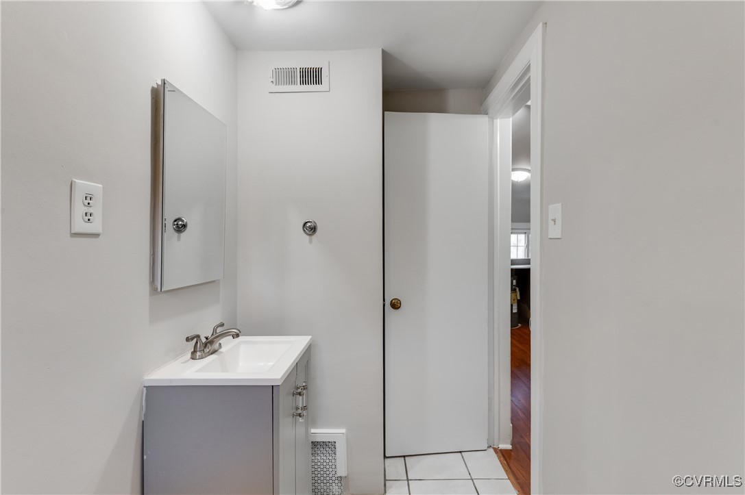 2821 Dumbarton Road Henrico, VA 23228 - Photo 30 of 37 Bathroom with tile patterned flooring and vanity