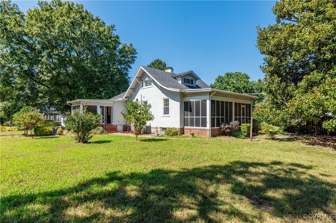 2821 Dumbarton Road Henrico, VA 23228 - Photo 36 of 37 Back of property with a yard and a sunroom