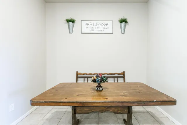 a reading room with furniture and a window