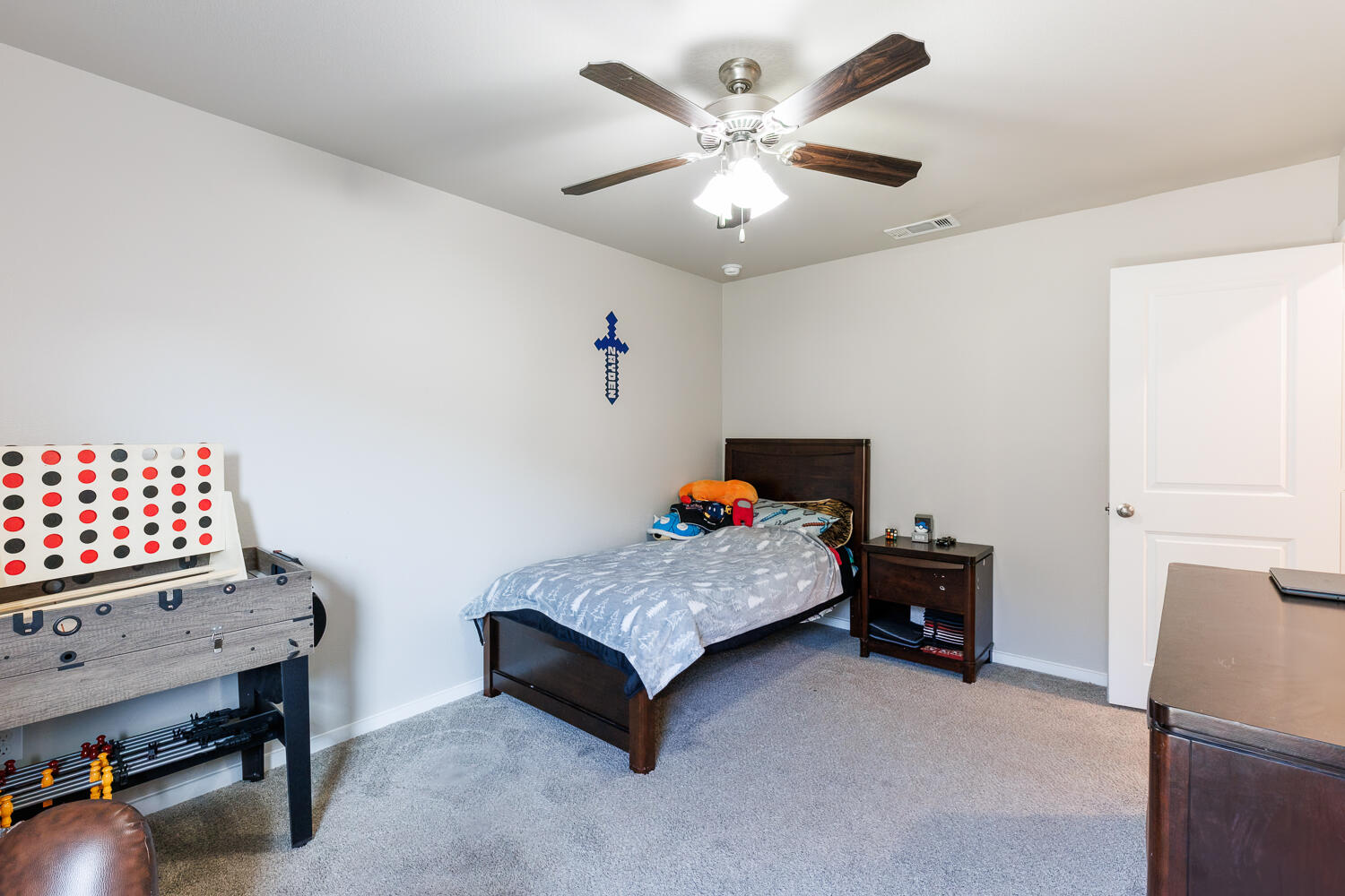 7322 29th Street Lubbock, TX 79407 - Photo 27 of 40 a bedroom with furniture and a large window
