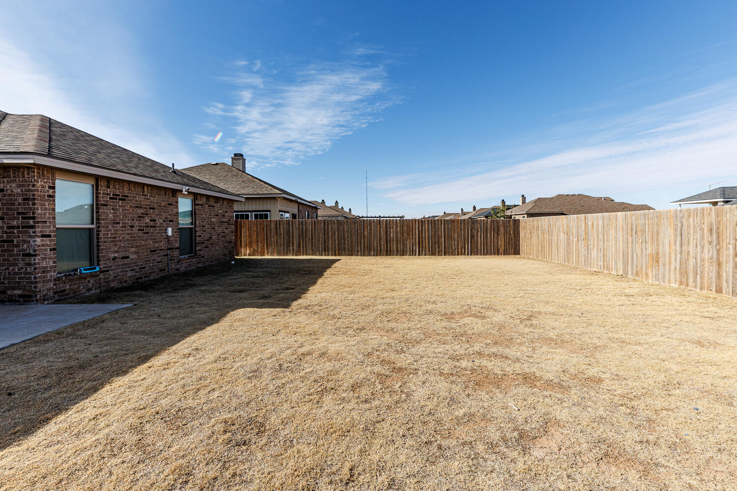 7322 29th Street Lubbock, TX 79407 - Photo 32 of 40 a view of a house with a snow in the yard