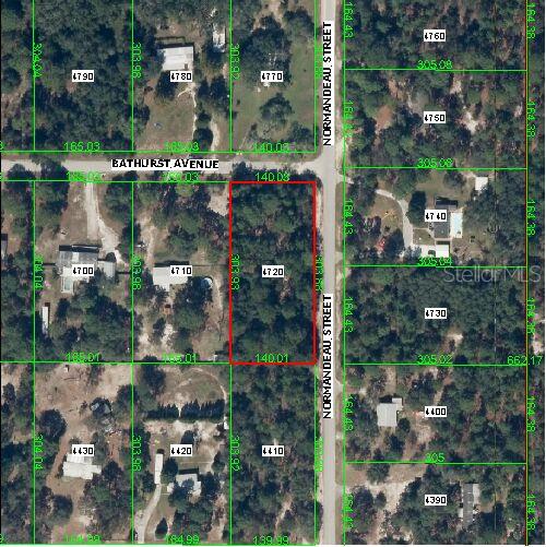 Normandeau & Bathurst Spring Hill Spring Hill, FL 34610 - Photo 1 of 1 an aerial view of lake and yard