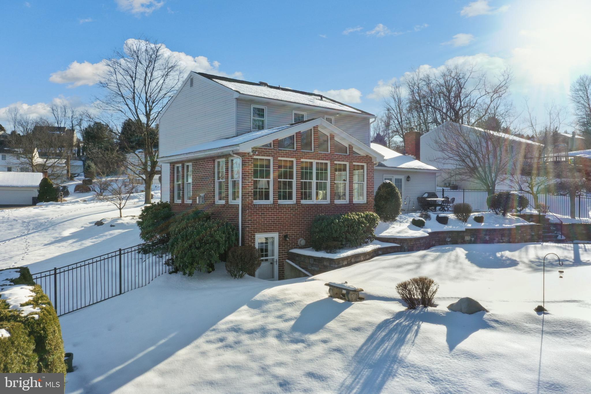 13 Marie Drive Sinking Spring, PA 19608 - Photo 34 of 55 a view of a house with backyard and sitting area