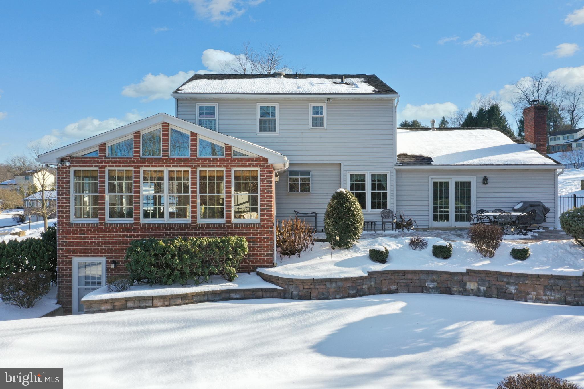 13 Marie Drive Sinking Spring, PA 19608 - Photo 35 of 55 a front view of a house with porch and garden