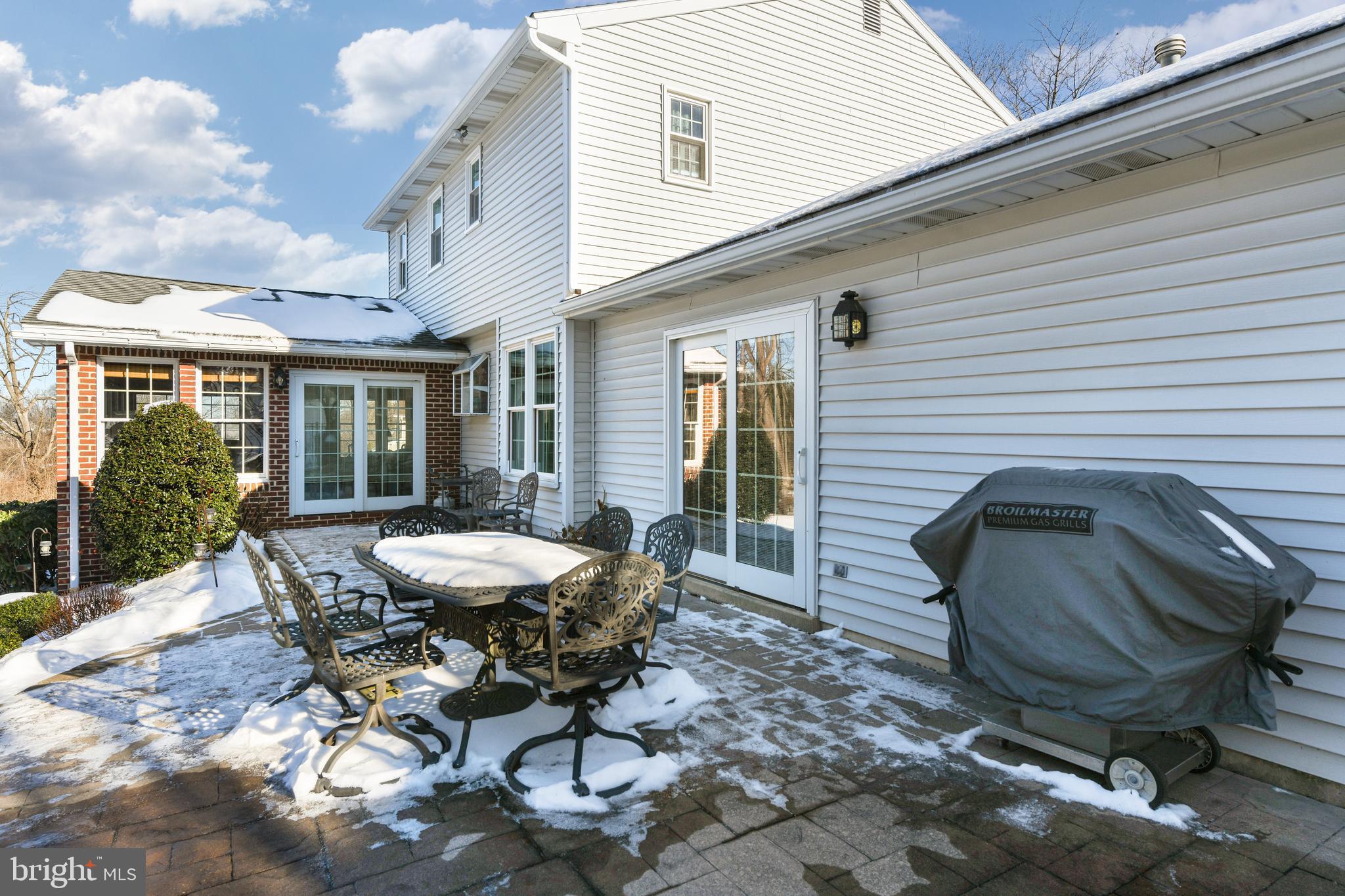 13 Marie Drive Sinking Spring, PA 19608 - Photo 43 of 55 a view of a patio with table and chairs with wooden floor and fence