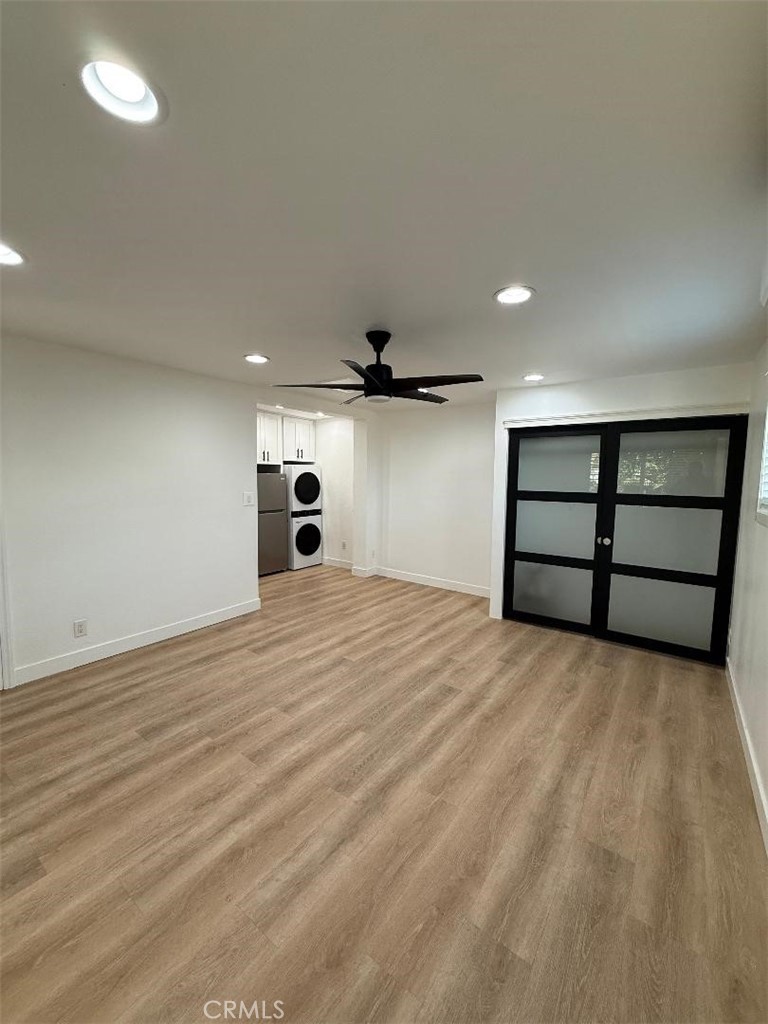 14352 A Flomar Drive Whittier, CA 90603 - Photo 4 of 10 a view of empty room with wooden floor