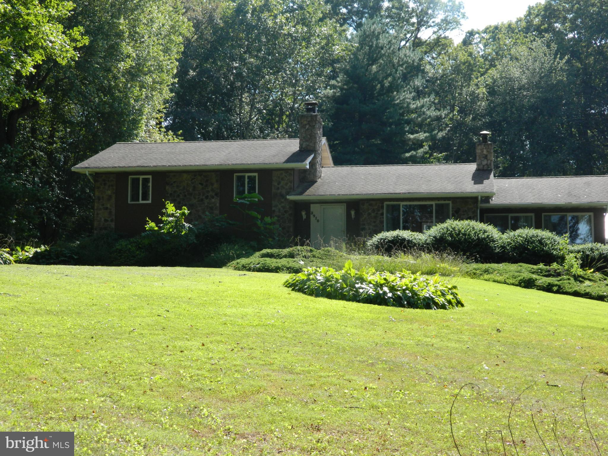 3910 Ady Road Pylesville, MD 21132 - Photo 2 of 24 a front view of a house with garden