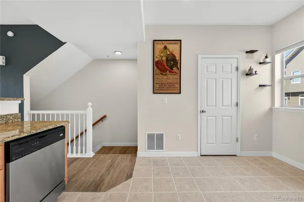 a large kitchen with a lot of counter space and appliances