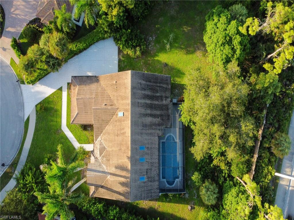 2140 Harlans Run Naples, FL 34105 - Photo 37 of 37 an aerial view of a house with a yard