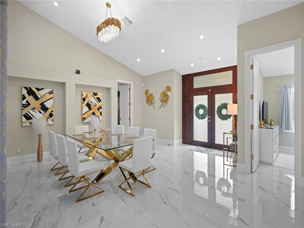 2140 Harlans Run Naples, FL 34105 - Photo 4 of 37 a view of a livingroom with furniture and a window