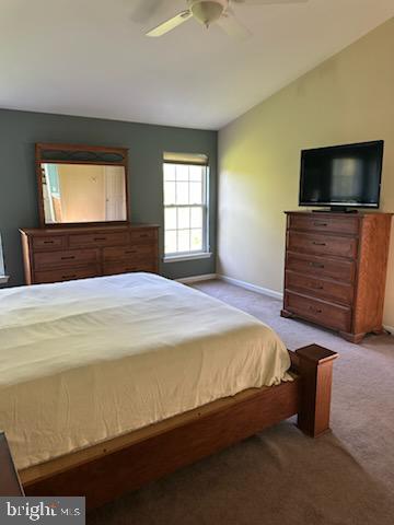 229 Barnhill Road Perkasie, PA 18944 - Photo 28 of 66 a bedroom with a bed and a flat screen tv