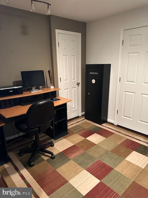 229 Barnhill Road Perkasie, PA 18944 - Photo 46 of 66 a view of a workspace with furniture and lamp on desk