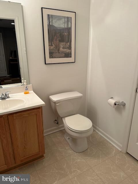 229 Barnhill Road Perkasie, PA 18944 - Photo 49 of 66 a bathroom with a toilet a sink and mirror