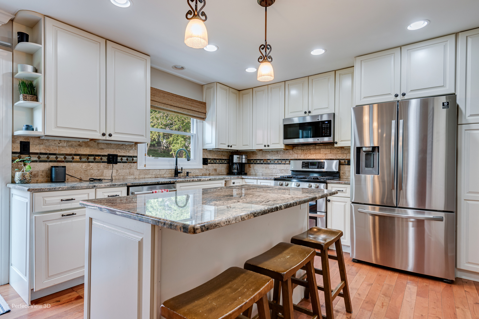985 West Bauer Road Naperville, IL 60563 - Photo 8 of 26 a kitchen with stainless steel appliances granite countertop a refrigerator a stove a sink a microwave and white cabinets with wooden floor