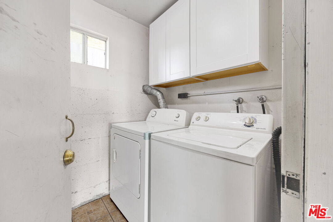 12330 Osborne Street, Unit 77 Pacoima, CA 91331 - Photo 16 of 32 a utility room with dryer and washer