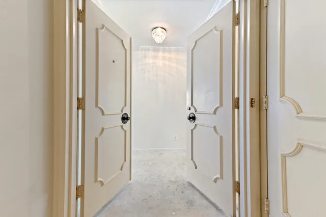 a bathroom with a granite countertop shower mirror and a sink