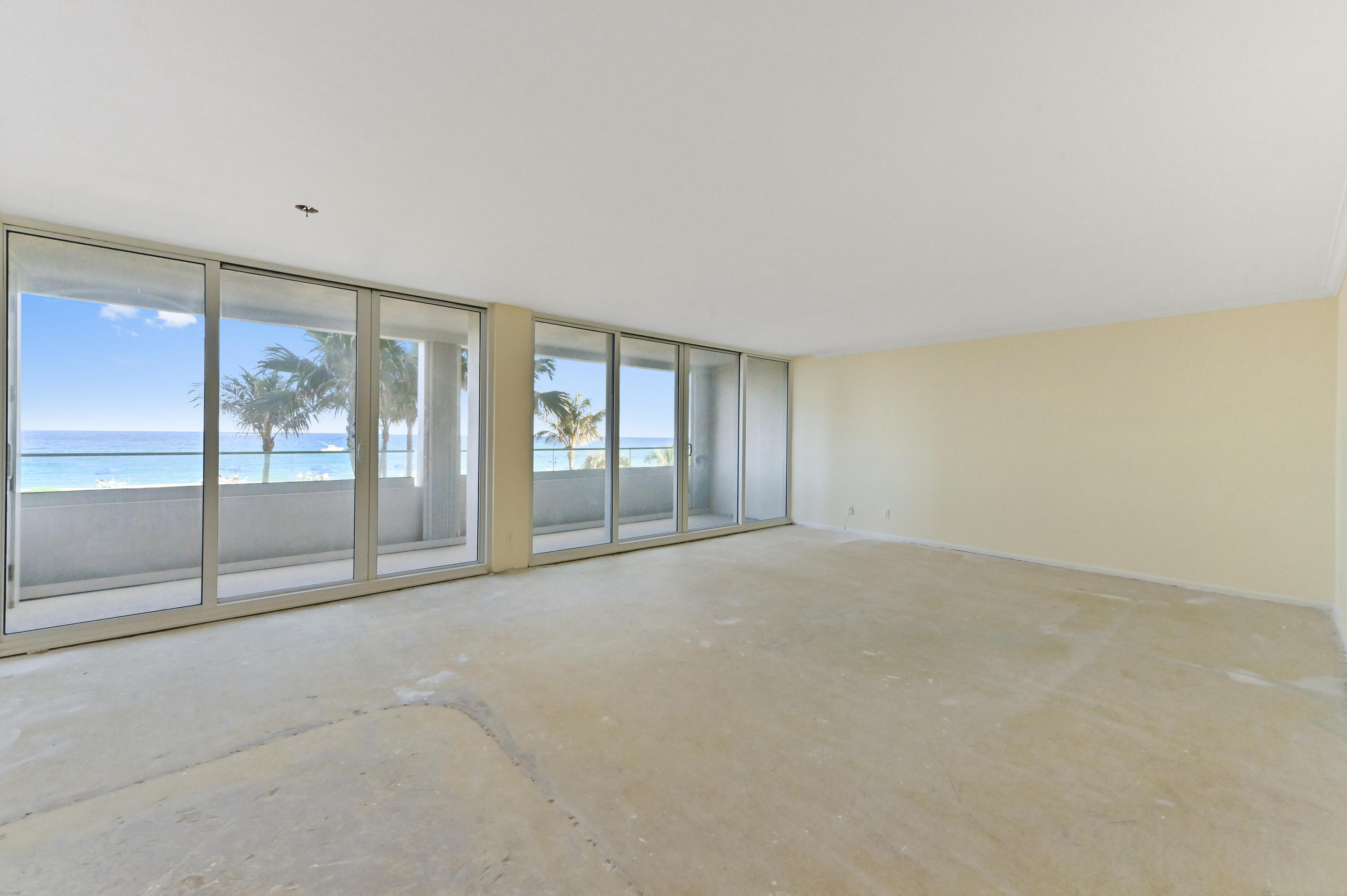 2800 South Ocean Boulevard, Unit 2K Boca Raton, FL 33432 - Photo 4 of 59 a view of an empty room with glass door