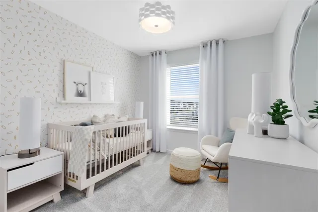 a bed room with furniture and a window