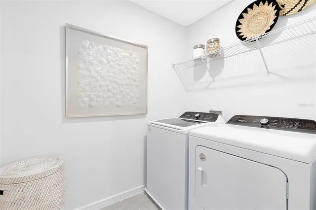 a bathroom with a washer and dryer