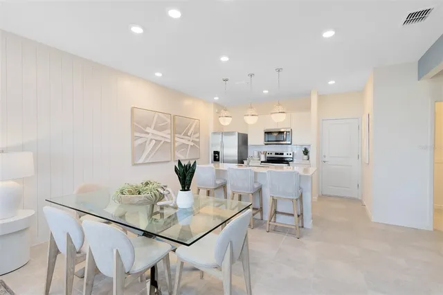 a view of a dining room with furniture