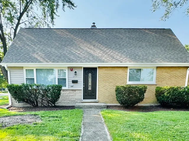 a view of outdoor space yard and front view of a house