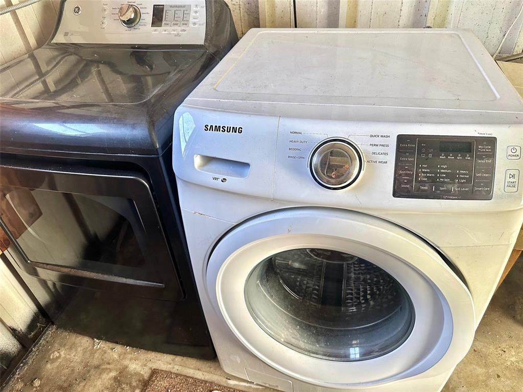 9900 Ulmerton Road, Unit 61 Largo, FL 33771 - Photo 15 of 17 a utility room with dryer and washer