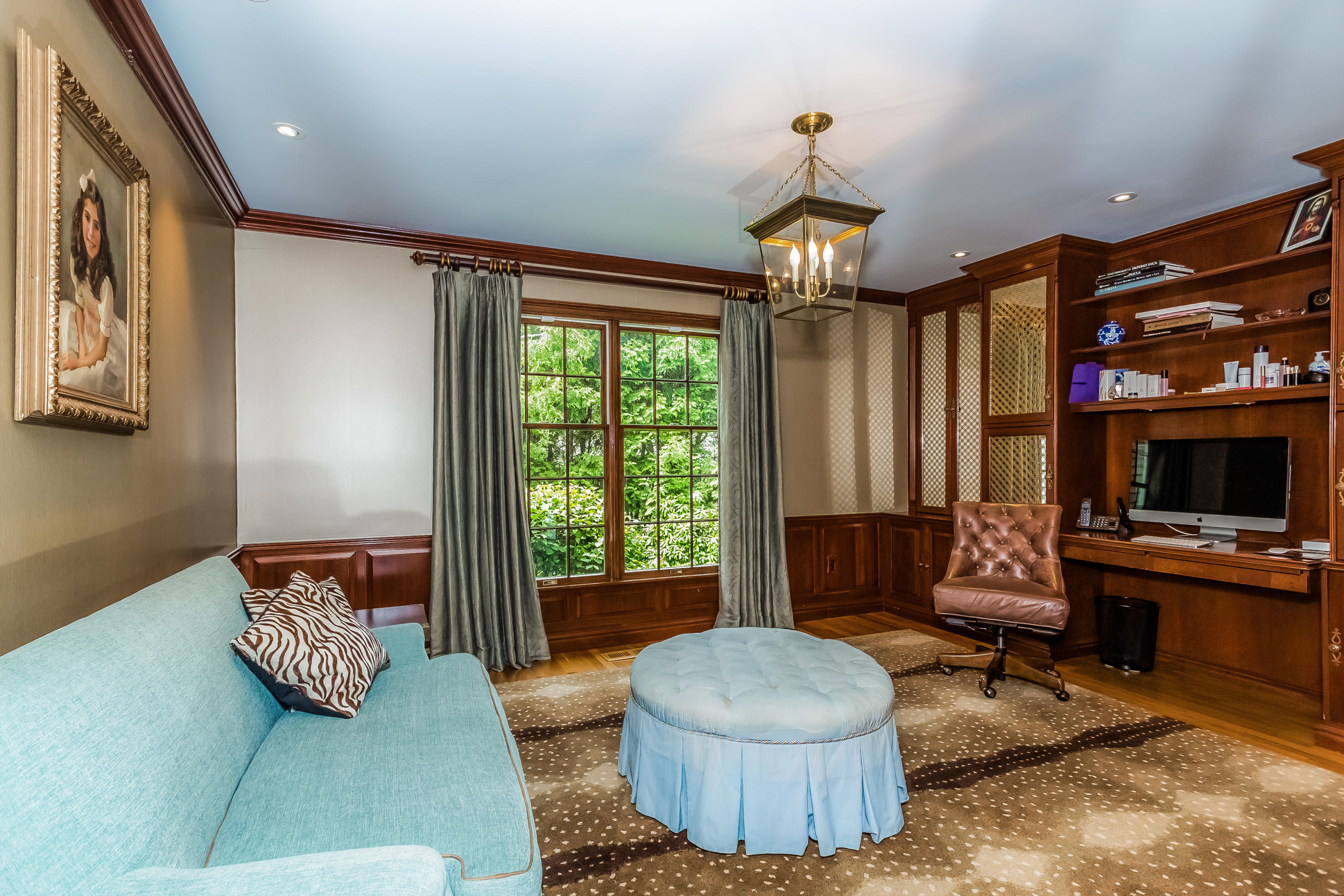 24 Birch Road Darien, CT 06820 - Photo 11 of 20 a living room with furniture and a flat screen tv