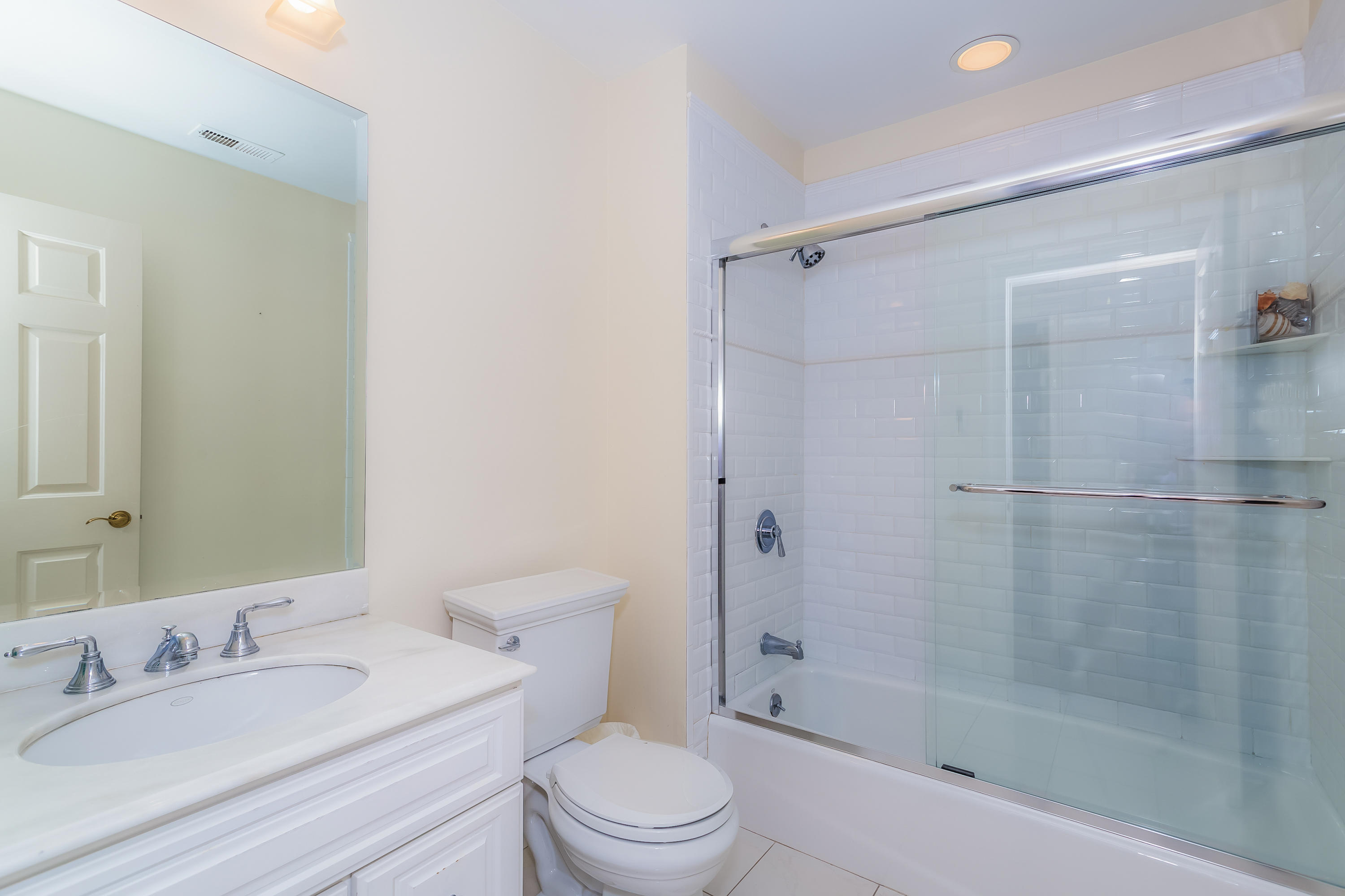 24 Birch Road Darien, CT 06820 - Photo 16 of 20 a bathroom with a sink a toilet and shower