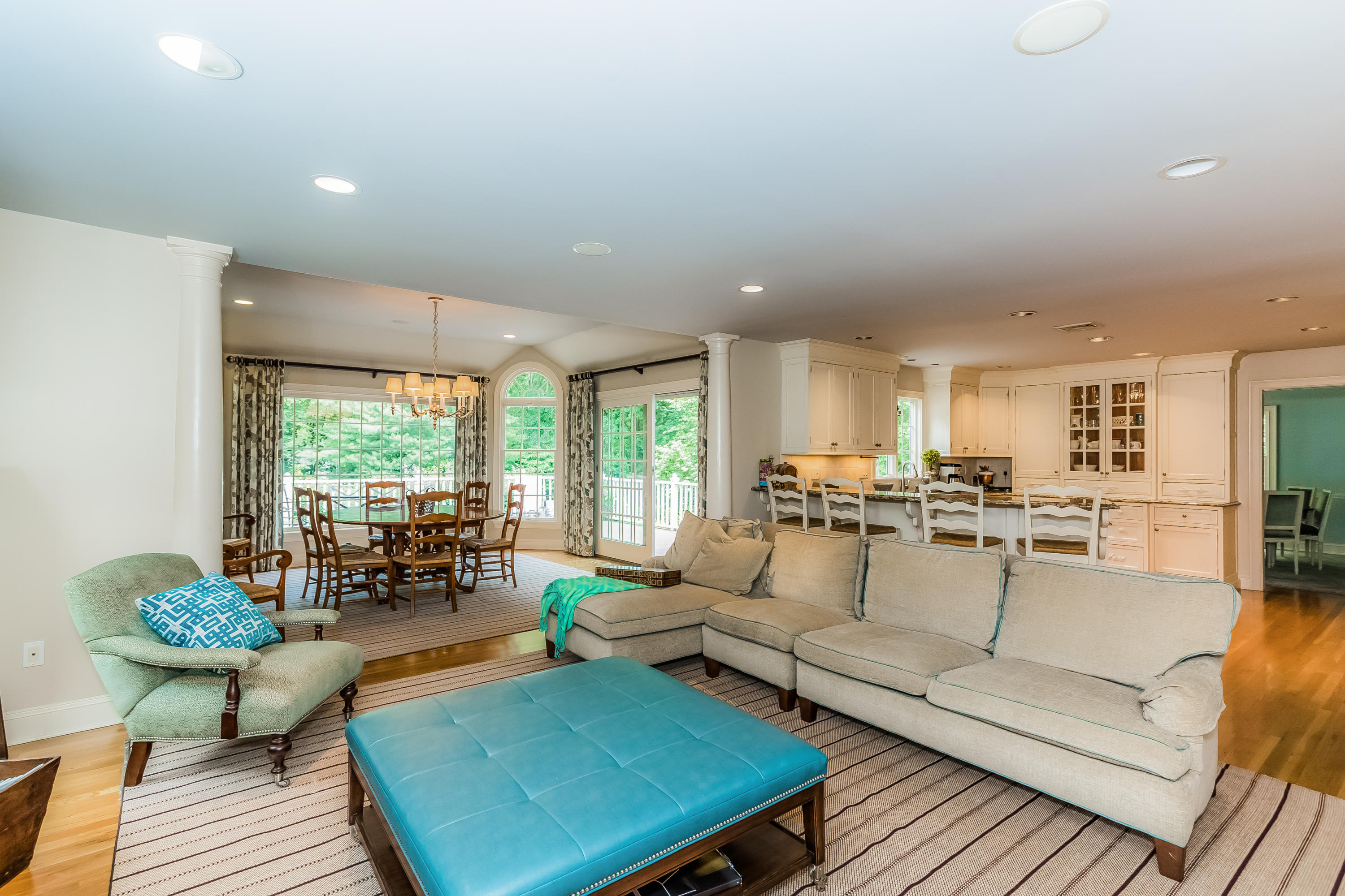 24 Birch Road Darien, CT 06820 - Photo 5 of 20 a living room with furniture kitchen view and a large window