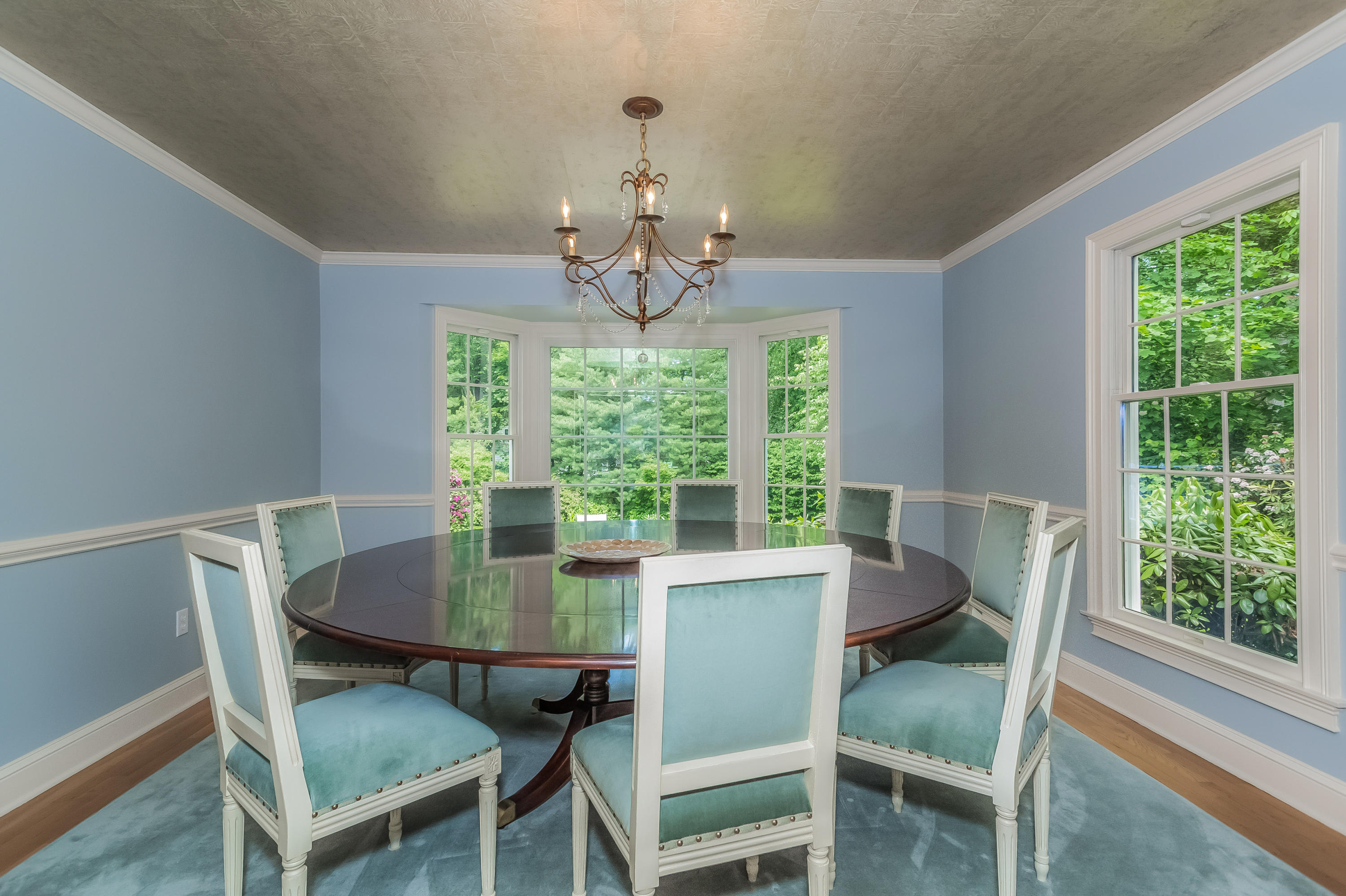 24 Birch Road Darien, CT 06820 - Photo 10 of 20 a view of a dining room with furniture window and outside view