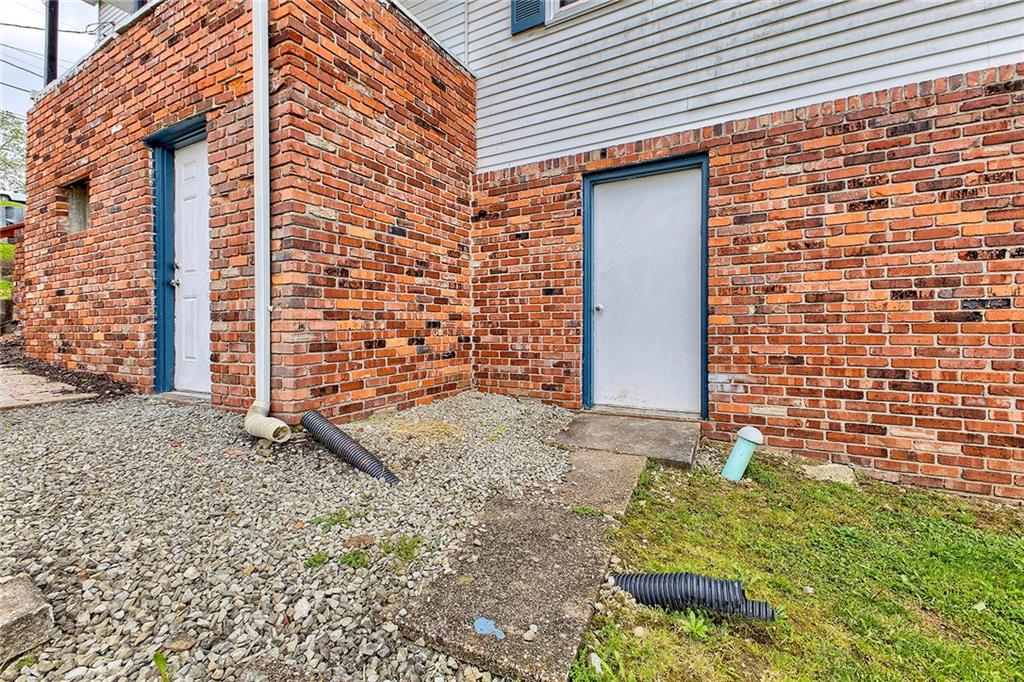 8002 Hayward Street Irwin, PA 15642 - Photo 27 of 31 a front view of a house with a yard